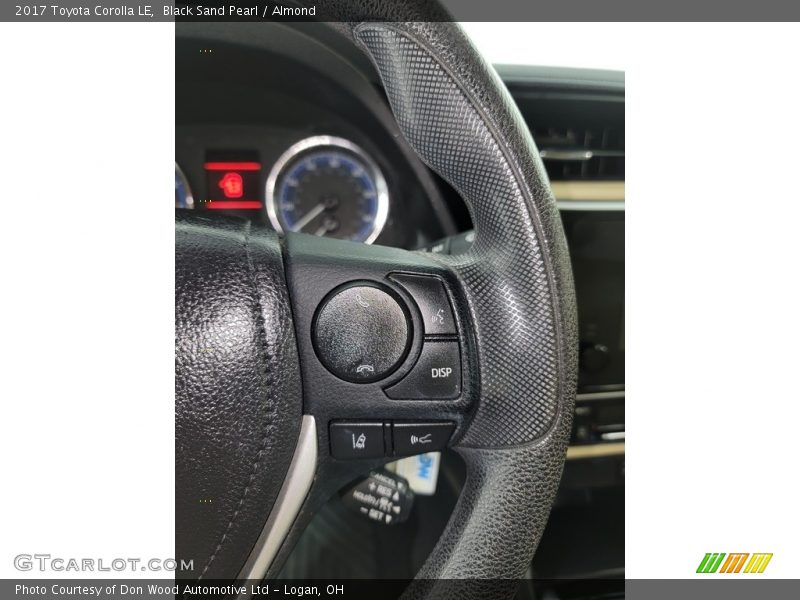 Black Sand Pearl / Almond 2017 Toyota Corolla LE