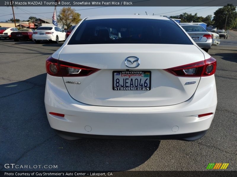 Snowflake White Pearl Mica / Black 2017 Mazda MAZDA3 Touring 4 Door