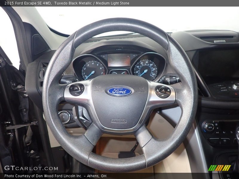 Tuxedo Black Metallic / Medium Light Stone 2015 Ford Escape SE 4WD