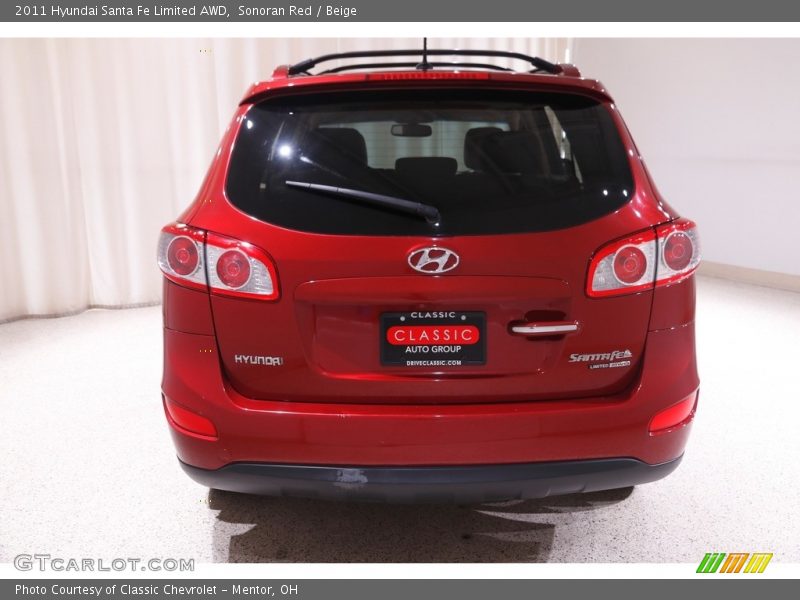 Sonoran Red / Beige 2011 Hyundai Santa Fe Limited AWD
