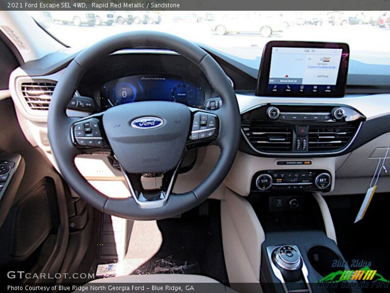 Rapid Red Metallic / Sandstone 2021 Ford Escape SEL 4WD