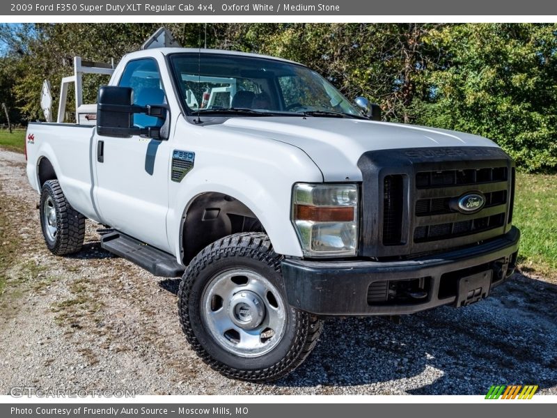 Front 3/4 View of 2009 F350 Super Duty XLT Regular Cab 4x4
