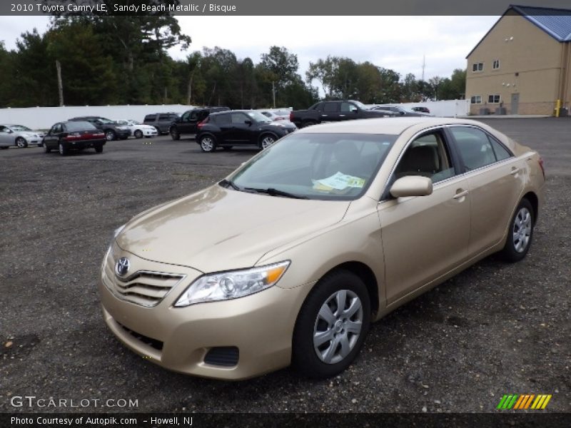 Sandy Beach Metallic / Bisque 2010 Toyota Camry LE