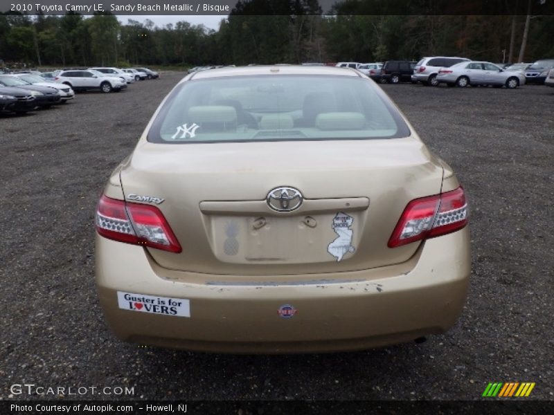 Sandy Beach Metallic / Bisque 2010 Toyota Camry LE