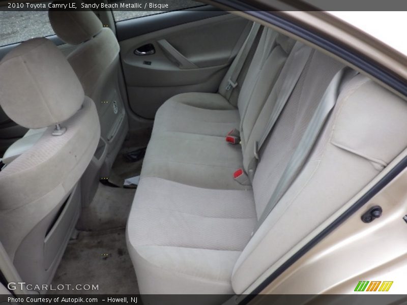 Sandy Beach Metallic / Bisque 2010 Toyota Camry LE