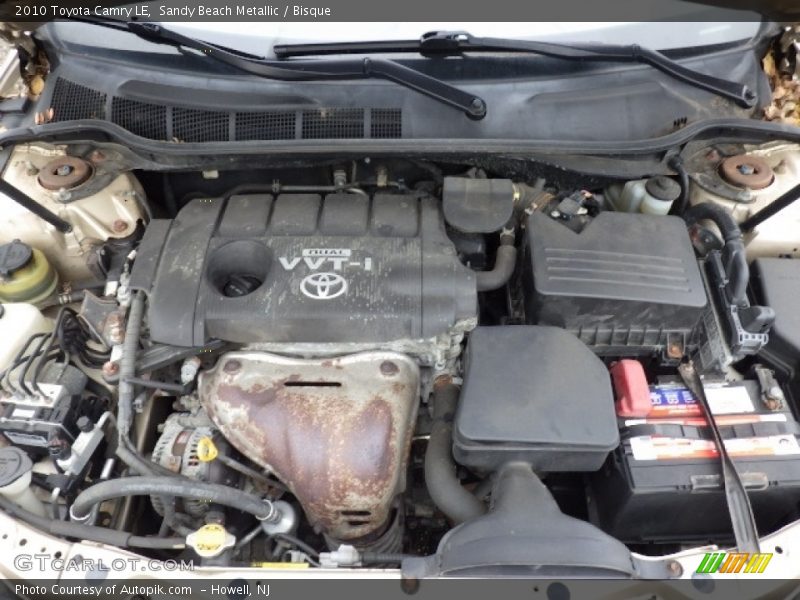Sandy Beach Metallic / Bisque 2010 Toyota Camry LE