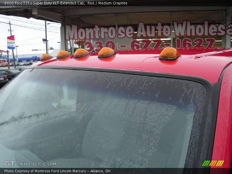 Red / Medium Graphite 2000 Ford F350 Super Duty XLT Extended Cab