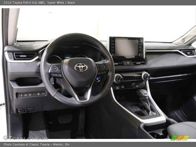 Super White / Black 2019 Toyota RAV4 XLE AWD