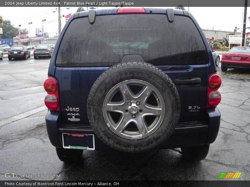 Patriot Blue Pearl / Light Taupe/Taupe 2004 Jeep Liberty Limited 4x4