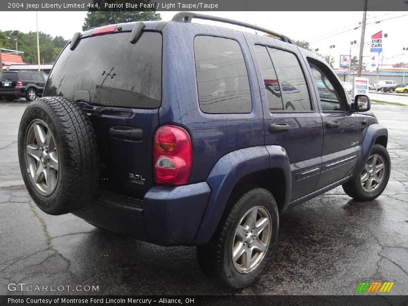 Patriot Blue Pearl / Light Taupe/Taupe 2004 Jeep Liberty Limited 4x4