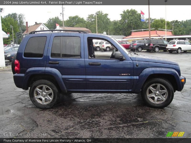 Patriot Blue Pearl / Light Taupe/Taupe 2004 Jeep Liberty Limited 4x4