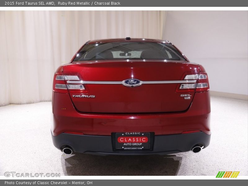 Ruby Red Metallic / Charcoal Black 2015 Ford Taurus SEL AWD