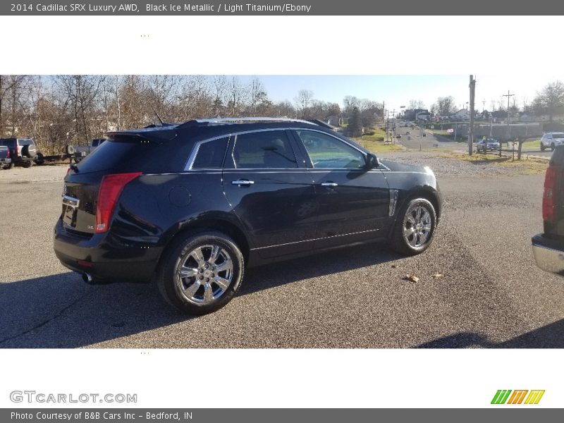 Black Ice Metallic / Light Titanium/Ebony 2014 Cadillac SRX Luxury AWD