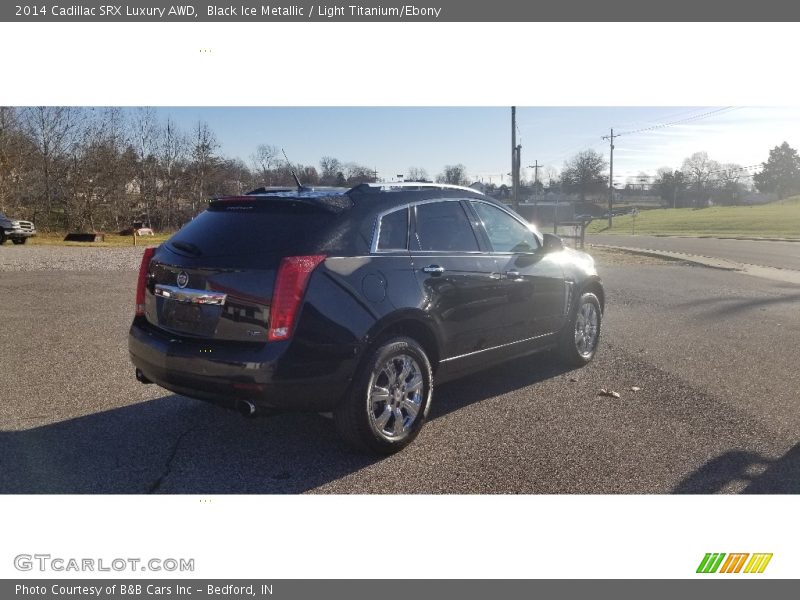 Black Ice Metallic / Light Titanium/Ebony 2014 Cadillac SRX Luxury AWD