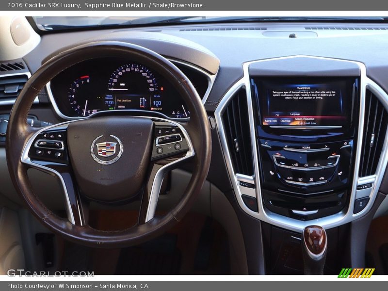 Sapphire Blue Metallic / Shale/Brownstone 2016 Cadillac SRX Luxury