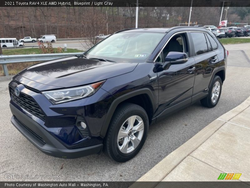 Front 3/4 View of 2021 RAV4 XLE AWD Hybrid