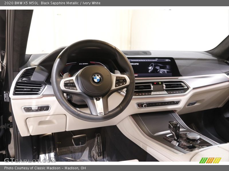 Black Sapphire Metallic / Ivory White 2020 BMW X5 M50i
