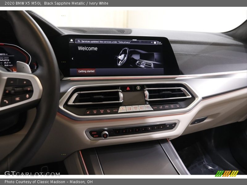 Black Sapphire Metallic / Ivory White 2020 BMW X5 M50i