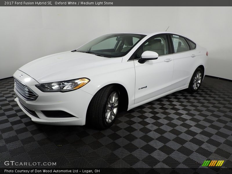 Oxford White / Medium Light Stone 2017 Ford Fusion Hybrid SE