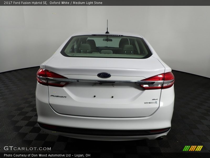 Oxford White / Medium Light Stone 2017 Ford Fusion Hybrid SE