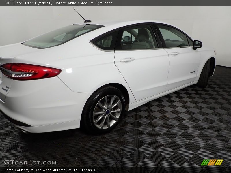 Oxford White / Medium Light Stone 2017 Ford Fusion Hybrid SE