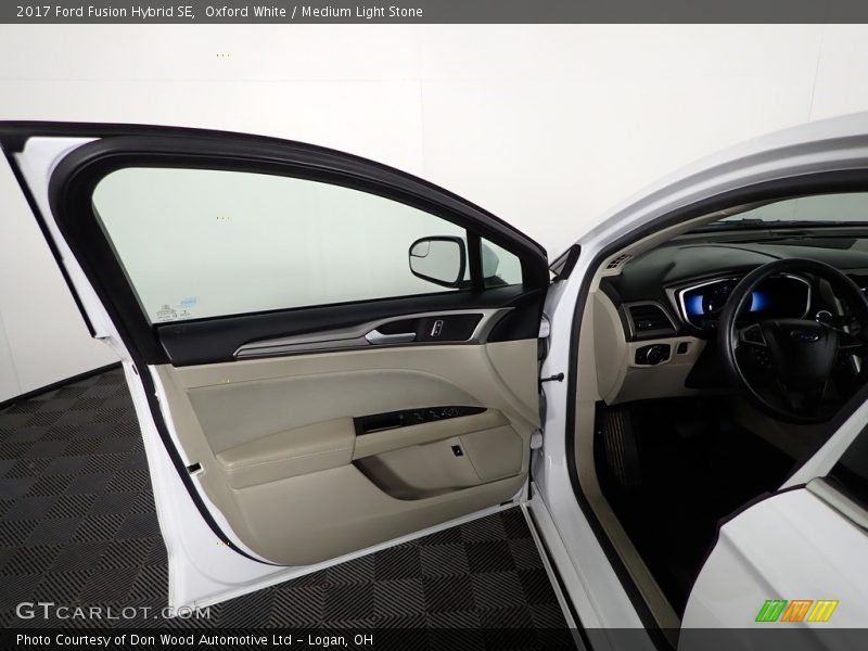 Oxford White / Medium Light Stone 2017 Ford Fusion Hybrid SE