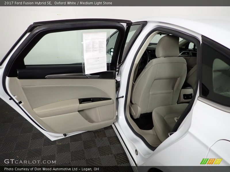 Oxford White / Medium Light Stone 2017 Ford Fusion Hybrid SE