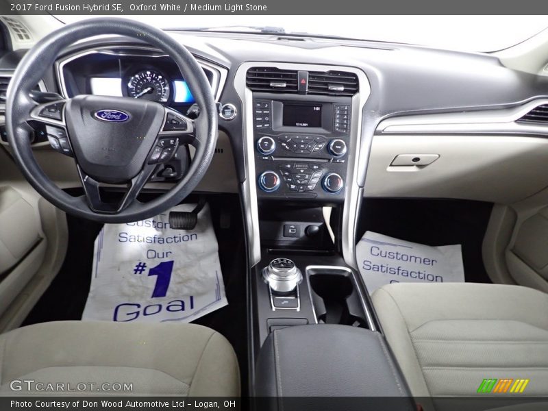 Oxford White / Medium Light Stone 2017 Ford Fusion Hybrid SE