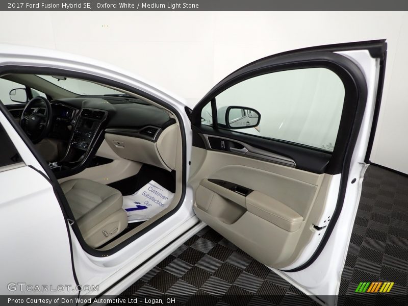 Oxford White / Medium Light Stone 2017 Ford Fusion Hybrid SE
