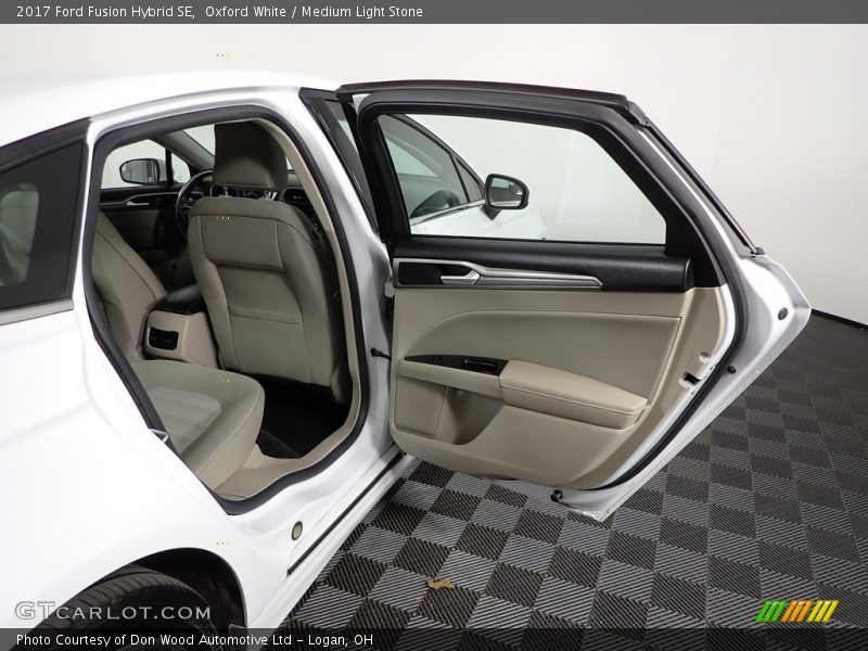Oxford White / Medium Light Stone 2017 Ford Fusion Hybrid SE