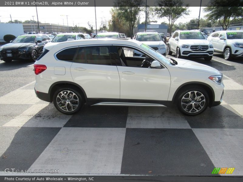 Alpine White / Oyster 2021 BMW X1 xDrive28i