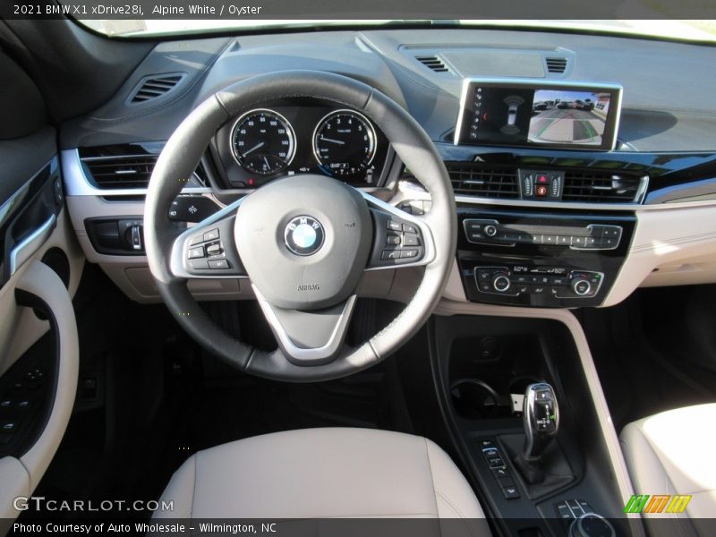 Alpine White / Oyster 2021 BMW X1 xDrive28i