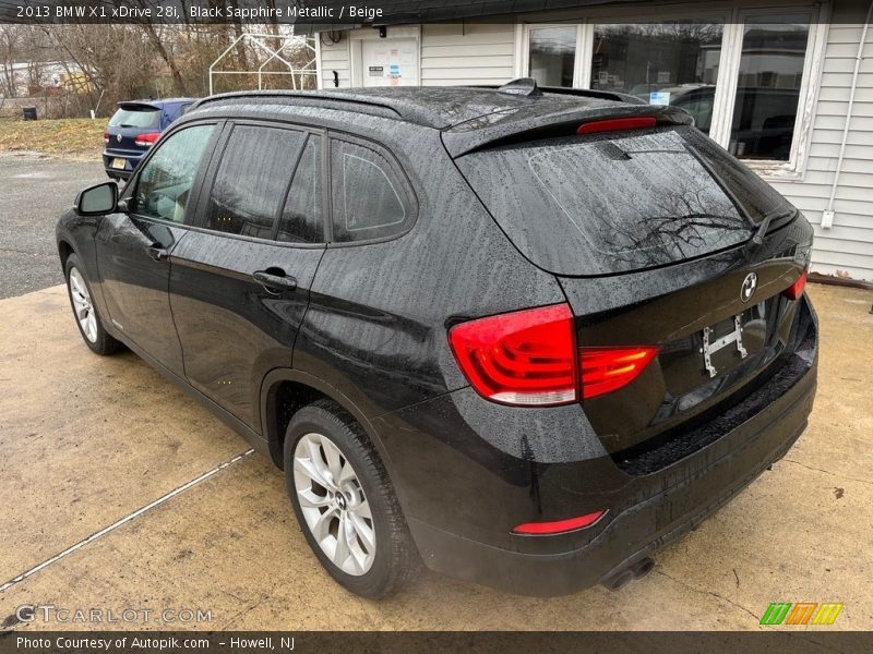 Black Sapphire Metallic / Beige 2013 BMW X1 xDrive 28i