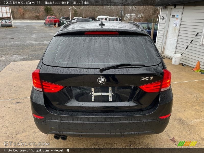 Black Sapphire Metallic / Beige 2013 BMW X1 xDrive 28i