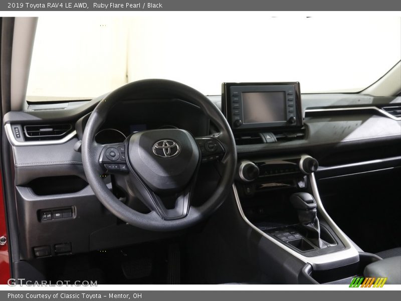 Ruby Flare Pearl / Black 2019 Toyota RAV4 LE AWD