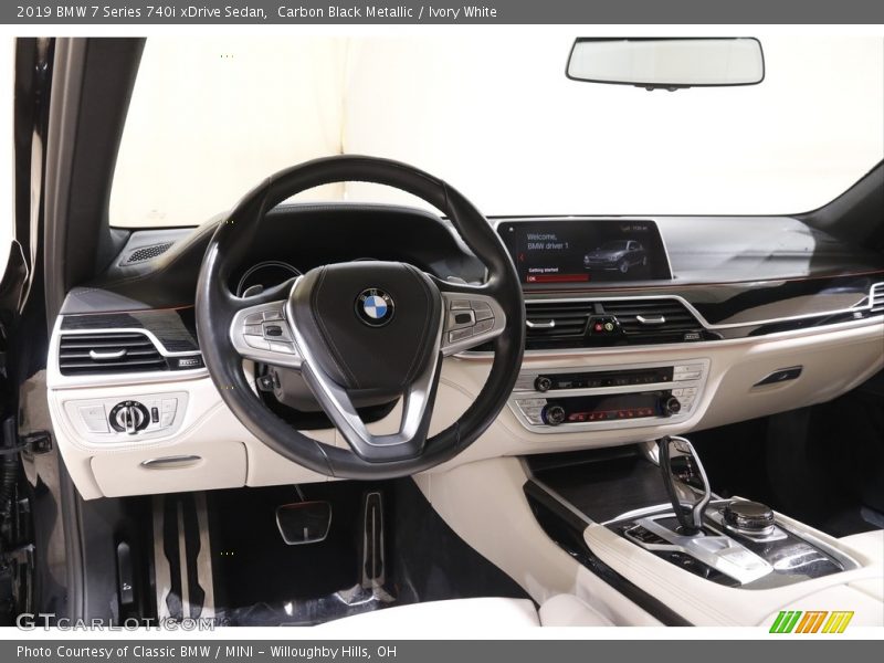 Carbon Black Metallic / Ivory White 2019 BMW 7 Series 740i xDrive Sedan