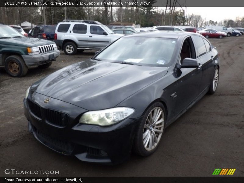 Black Sapphire Metallic / Cinnamon Brown 2011 BMW 5 Series 550i xDrive Sedan