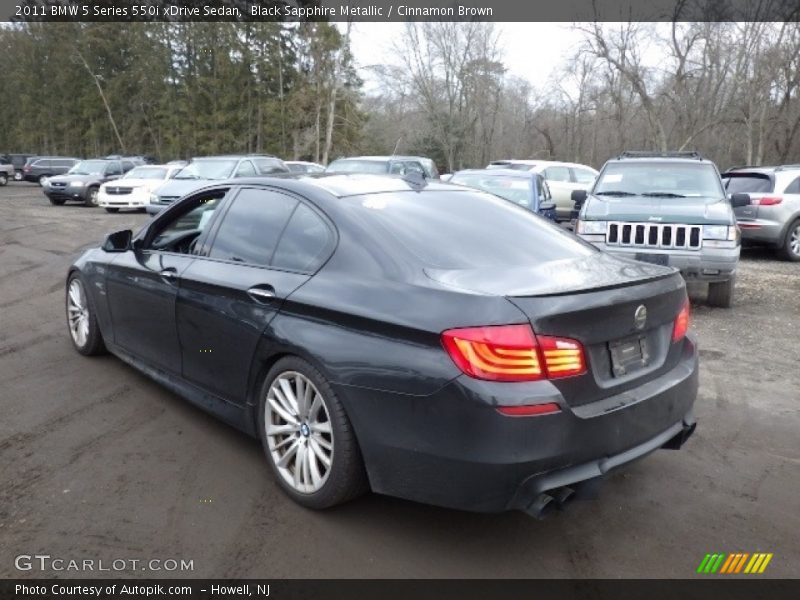 Black Sapphire Metallic / Cinnamon Brown 2011 BMW 5 Series 550i xDrive Sedan