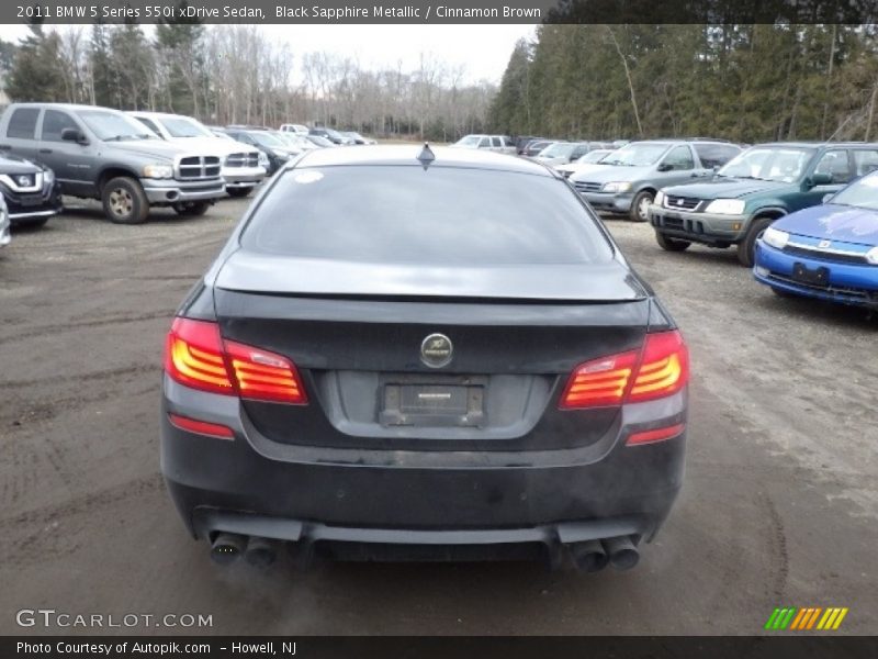 Black Sapphire Metallic / Cinnamon Brown 2011 BMW 5 Series 550i xDrive Sedan