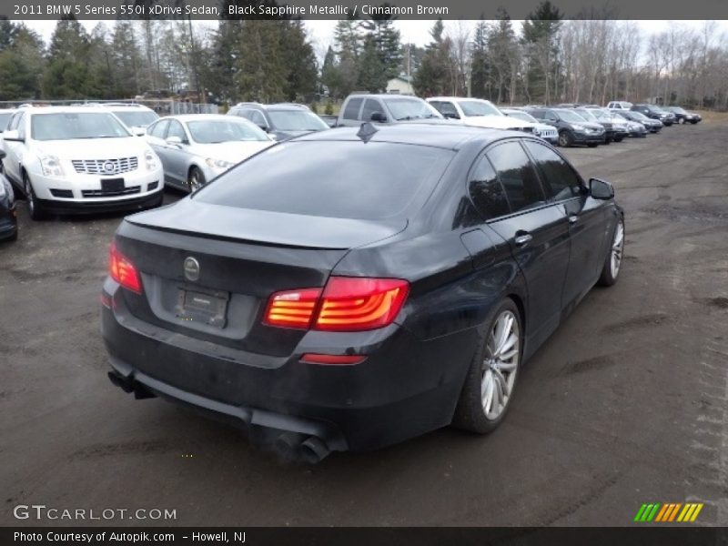 Black Sapphire Metallic / Cinnamon Brown 2011 BMW 5 Series 550i xDrive Sedan