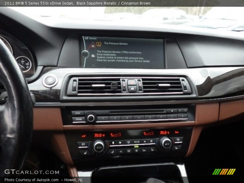 Black Sapphire Metallic / Cinnamon Brown 2011 BMW 5 Series 550i xDrive Sedan