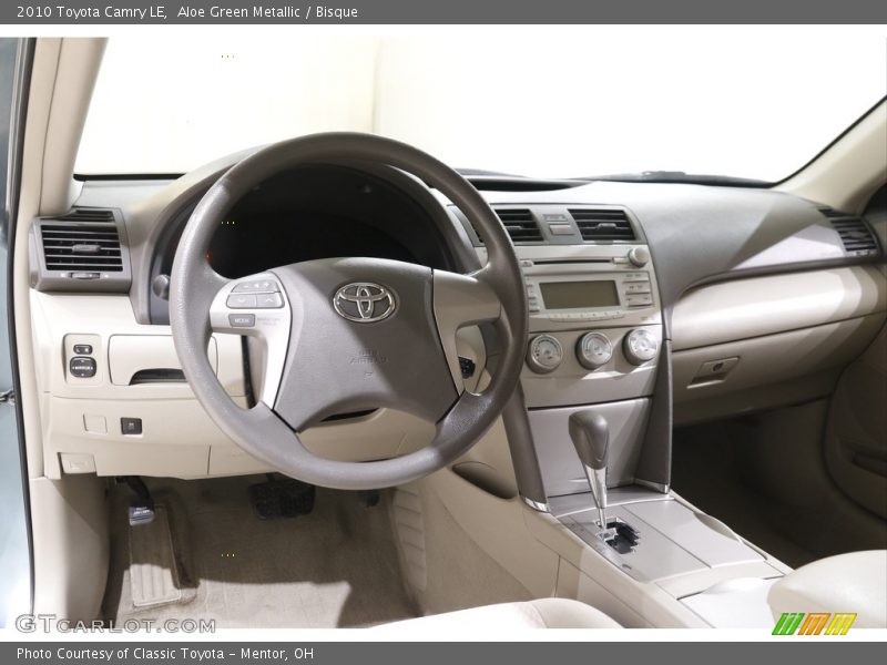 Aloe Green Metallic / Bisque 2010 Toyota Camry LE