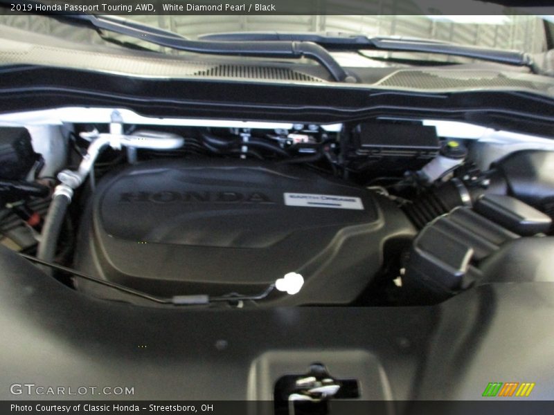 White Diamond Pearl / Black 2019 Honda Passport Touring AWD