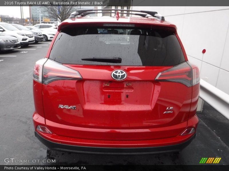 Barcelona Red Metallic / Black 2016 Toyota RAV4 LE AWD