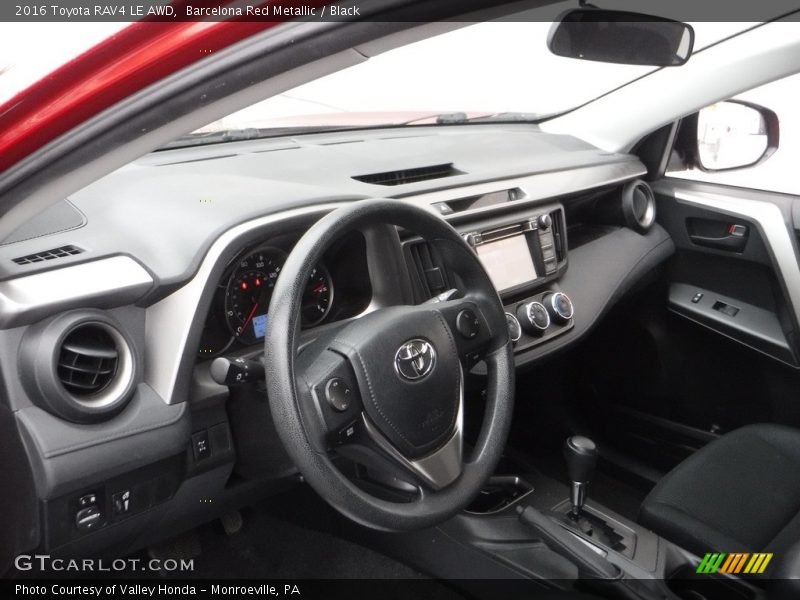 Barcelona Red Metallic / Black 2016 Toyota RAV4 LE AWD