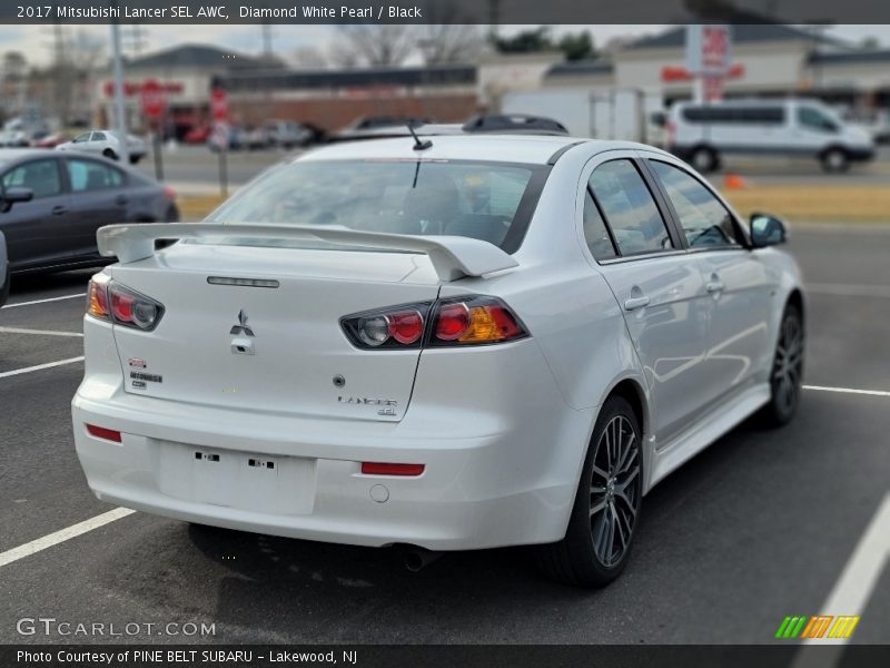Diamond White Pearl / Black 2017 Mitsubishi Lancer SEL AWC