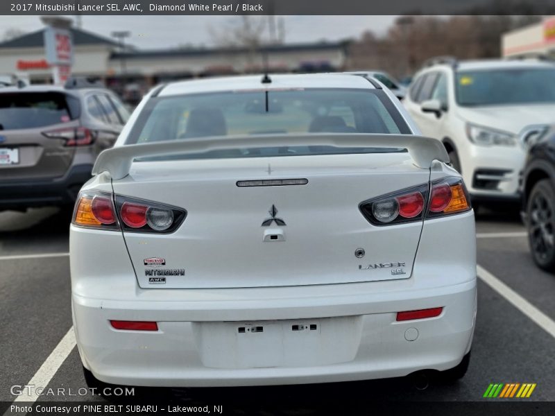 Diamond White Pearl / Black 2017 Mitsubishi Lancer SEL AWC