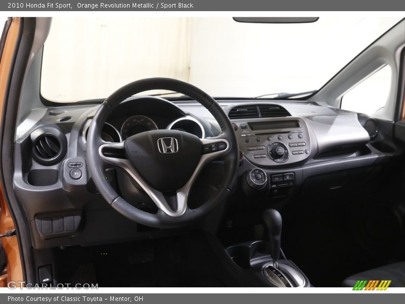 Orange Revolution Metallic / Sport Black 2010 Honda Fit Sport