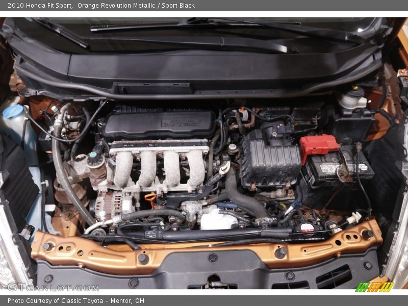 Orange Revolution Metallic / Sport Black 2010 Honda Fit Sport