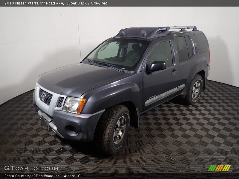 Super Black / Gray/Red 2010 Nissan Xterra Off Road 4x4